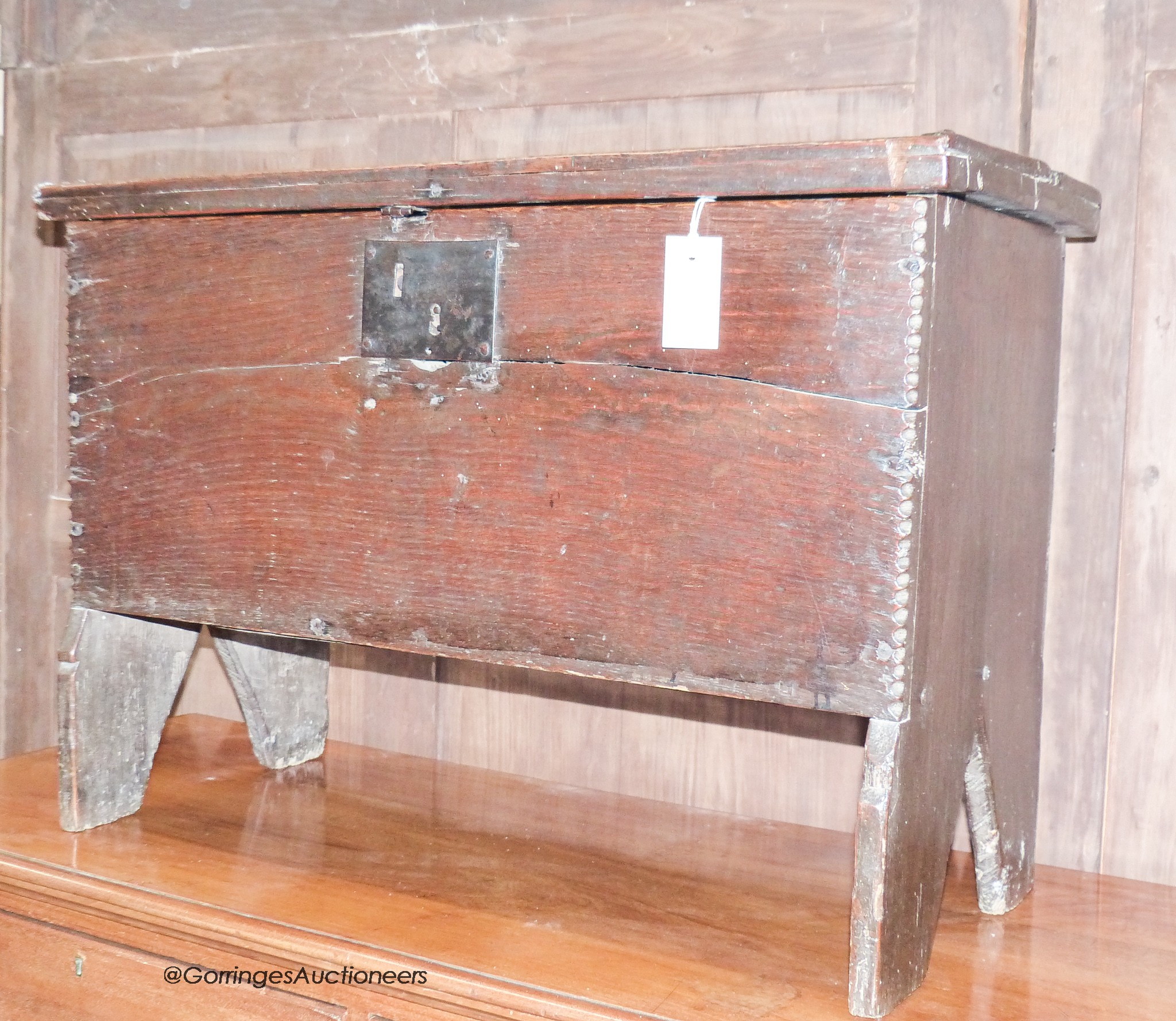 A 17th century oak six-plank coffer of small proportions